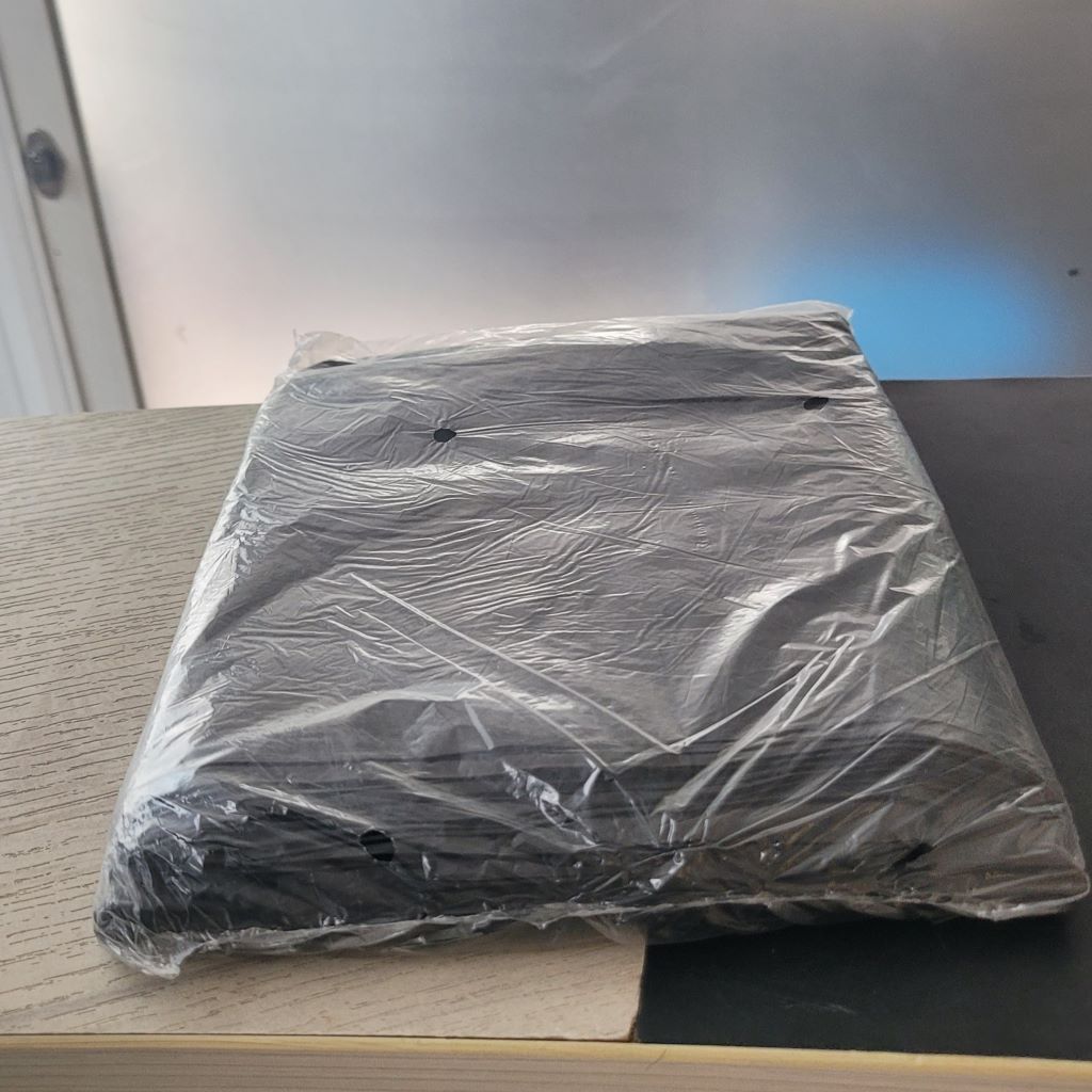 Funda negra para basura.